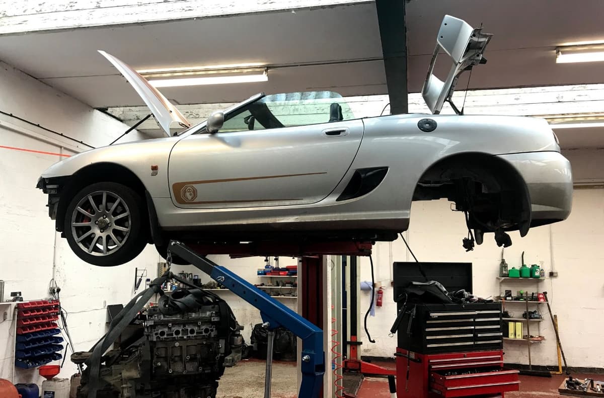 Mechanic working on a car